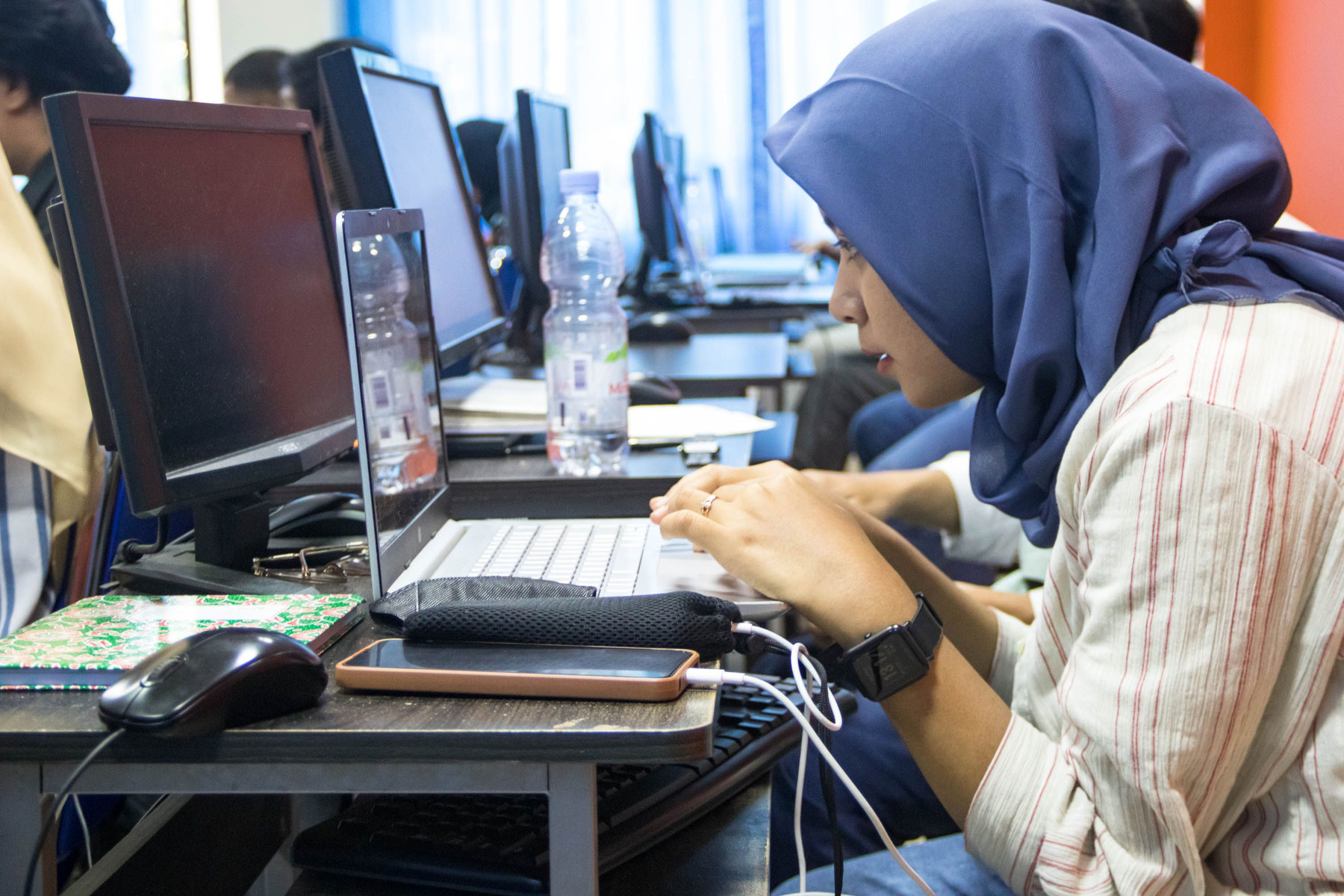 Young woman building digital and technical skills