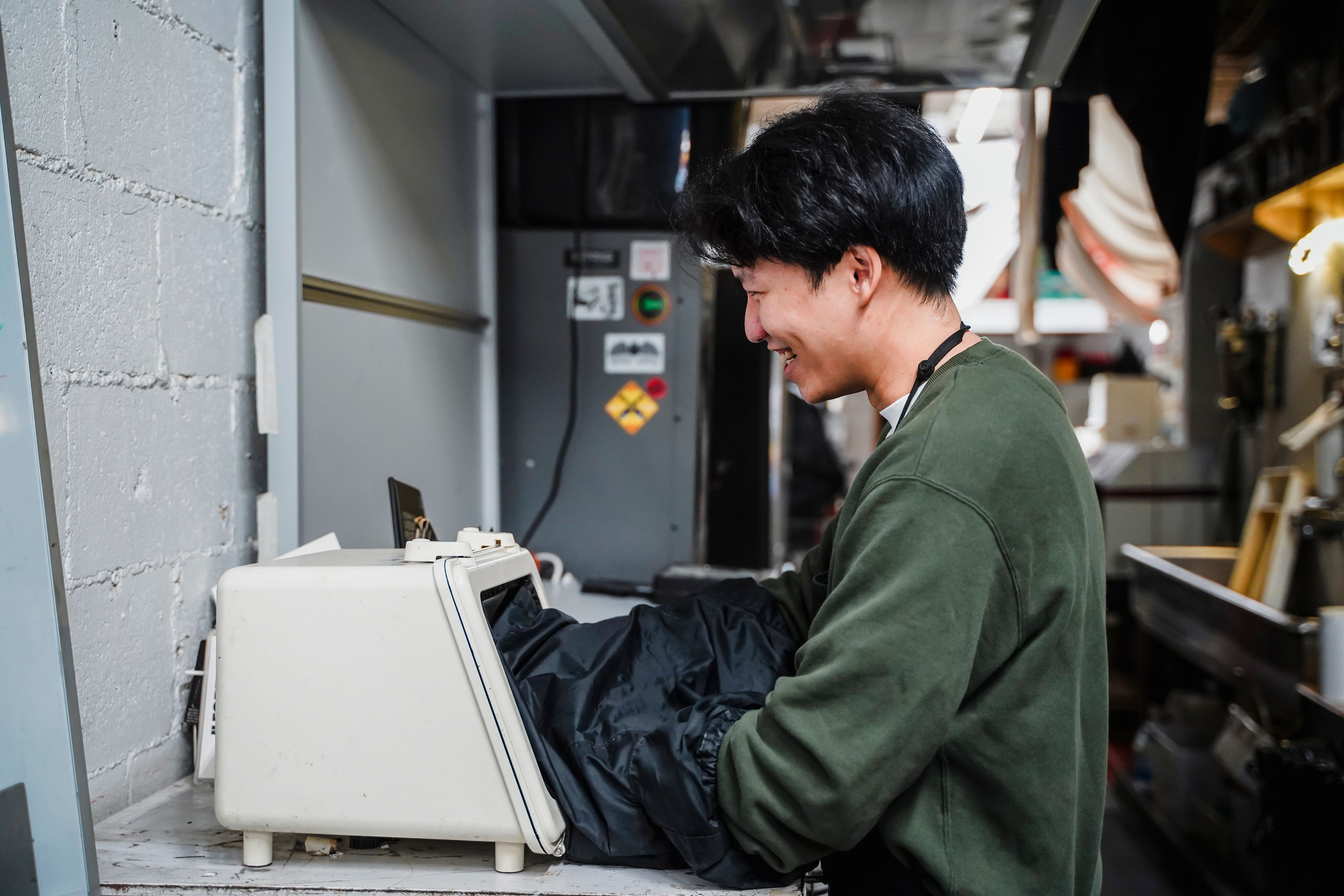 Young worker gaining production experience